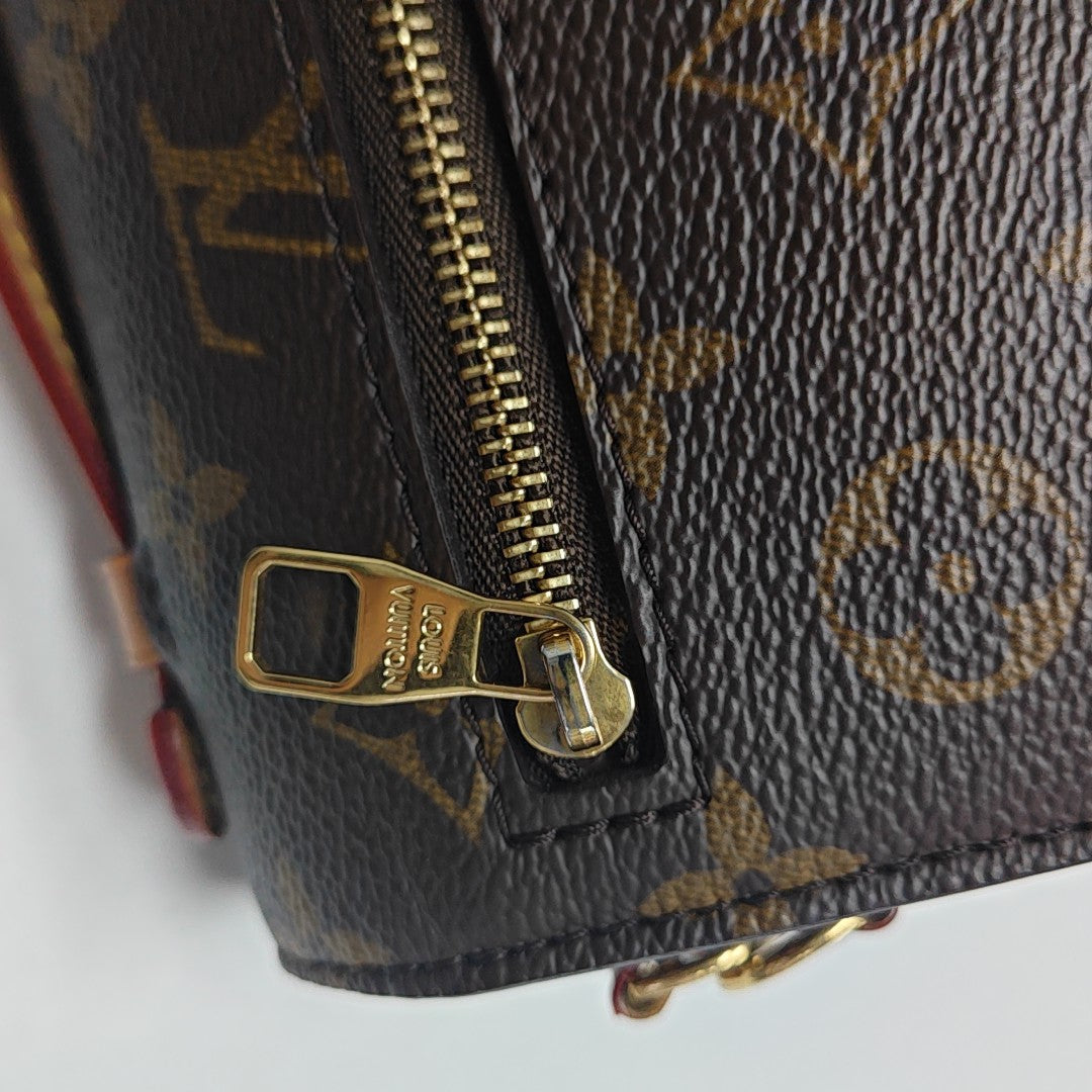 MÉTIS EAST WEST Monogram Coated Canvas Brown