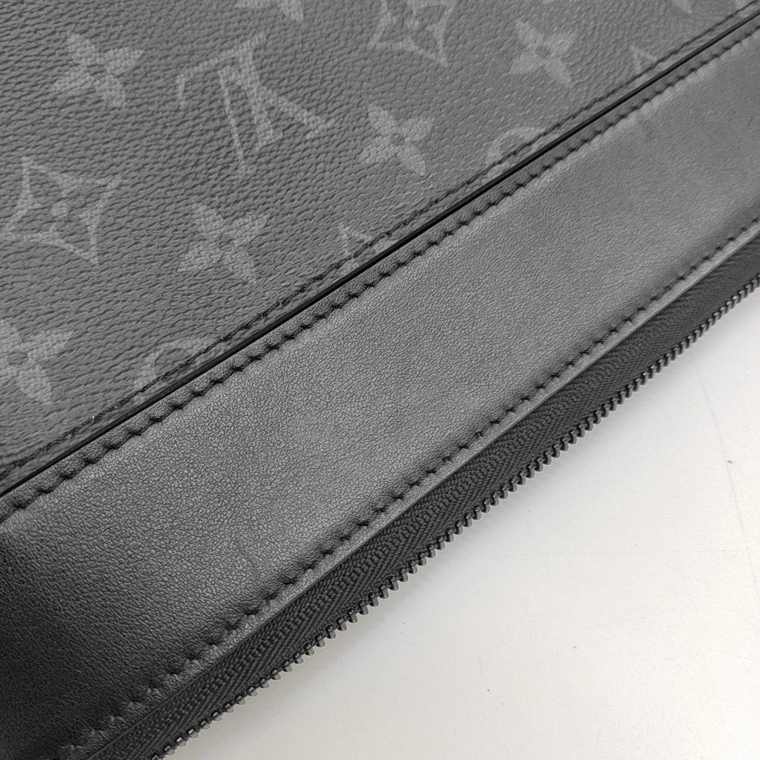 Pochette Voyag Monogram Coated Canvas Black