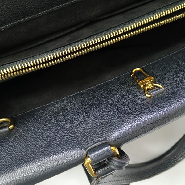 VÉNUS Monogram Coated Canvas Brown