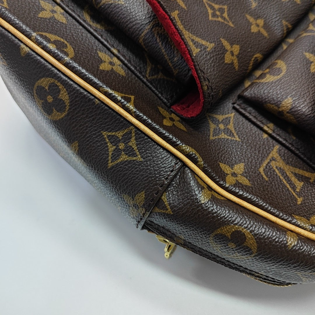 EXCENTRI-CITE Monogram Coated Canvas Brown