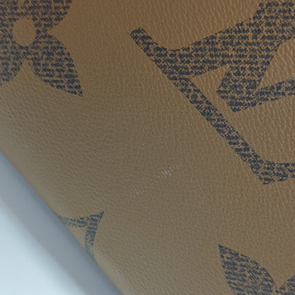 ONTHEGO MM Monogram Coated Canvas Brown