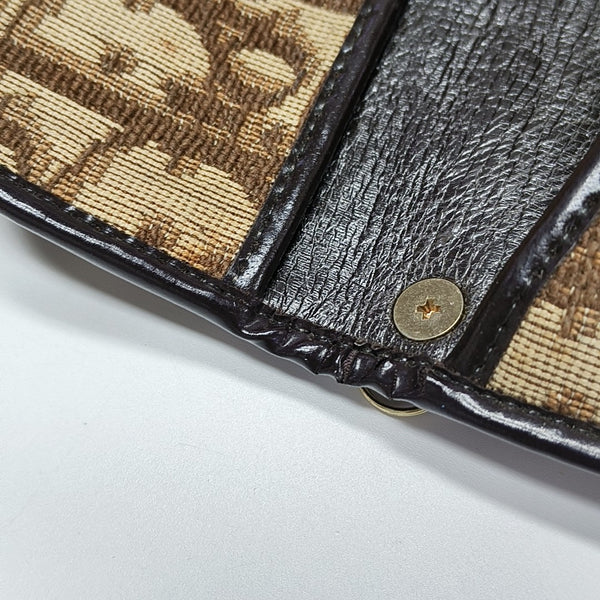 Oblique Canvas Clutch Brown