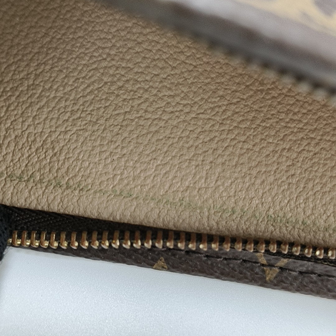TOILET POCKET 26 Monogram Coated Canvas Brown