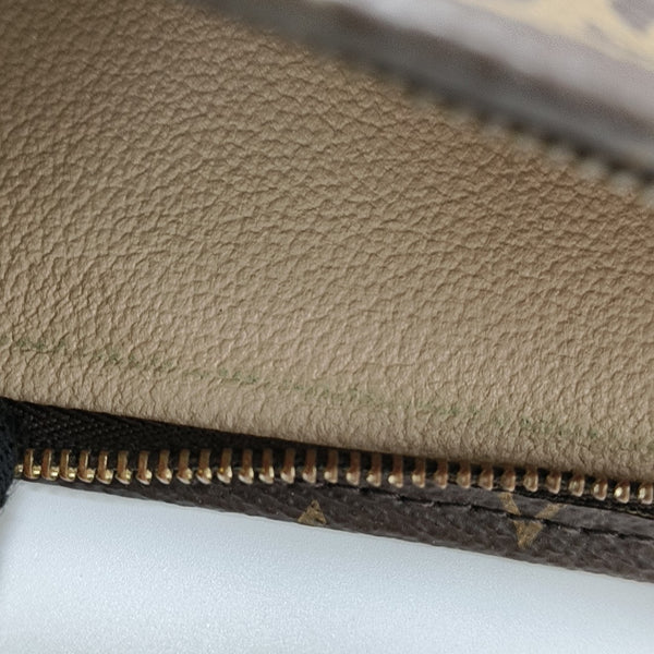 TOILET POCKET 26 Monogram Coated Canvas Brown