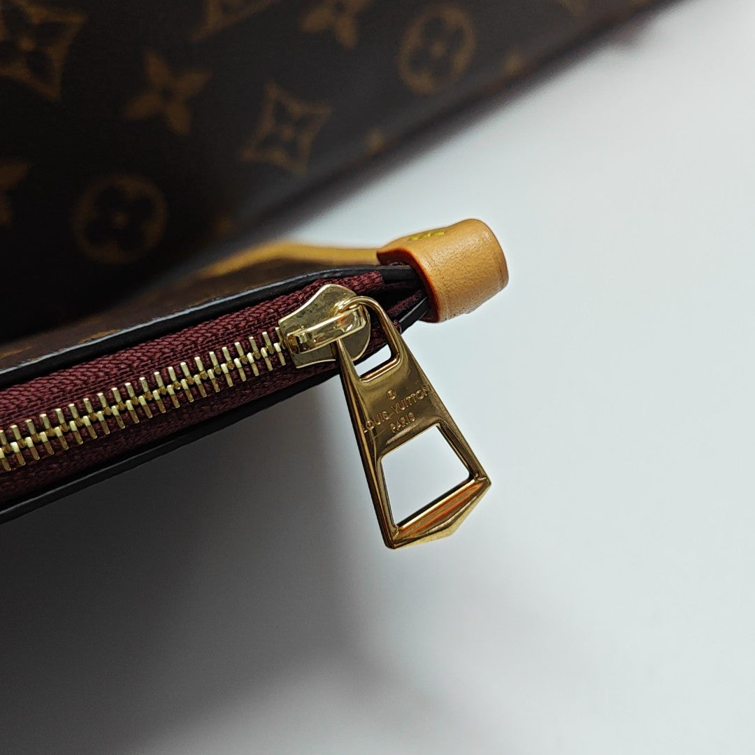 CARRYALL PM Monogram Coated Canvas Brown