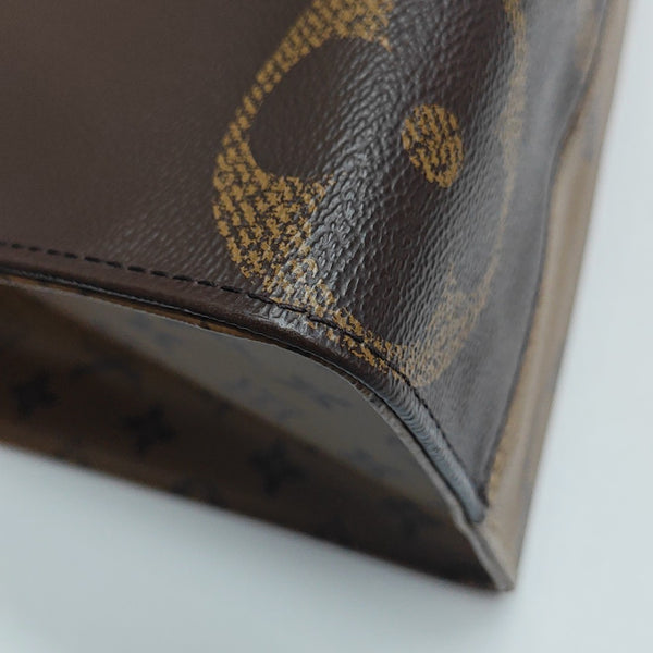 ONTHEGO MM Monogram Coated Canvas Brown