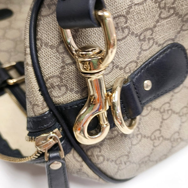Authenticated pre-owned  Joy Monogram Coated Canvas Beige - Shoulder Bag at Looply