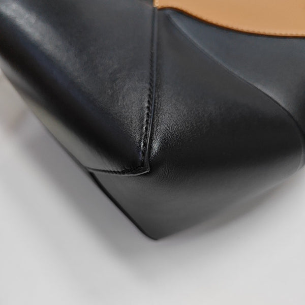 Authenticated pre-owned  Puzzle Fold Mini Calfskin Black - Tote Bag at Looply