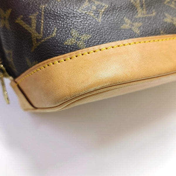 ALMA PM Monogram Coated Canvas Brown