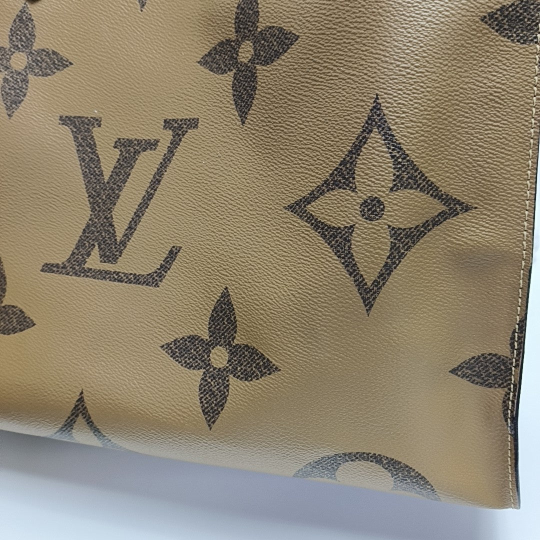 ONTHEGO GM Monogram Coated Canvas Brown