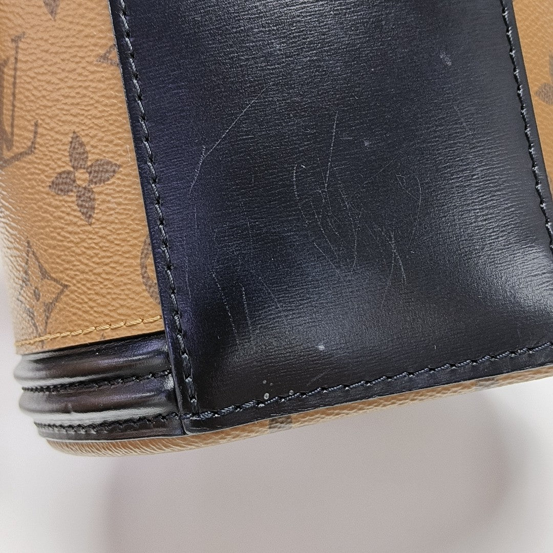 CANNES PM Monogram Coated Canvas Brown