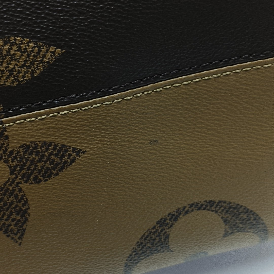 ONTHEGO GM Monogram Coated Canvas Brown
