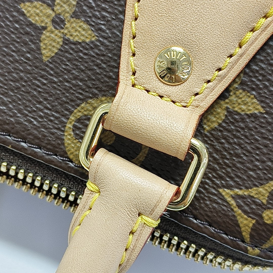 SPEEDY 20 Monogram Coated Canvas Brown