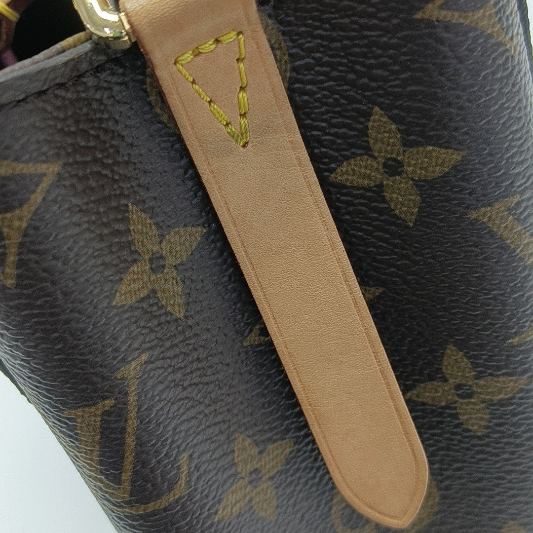 MONTAIGNE Monogram Coated Canvas Brown