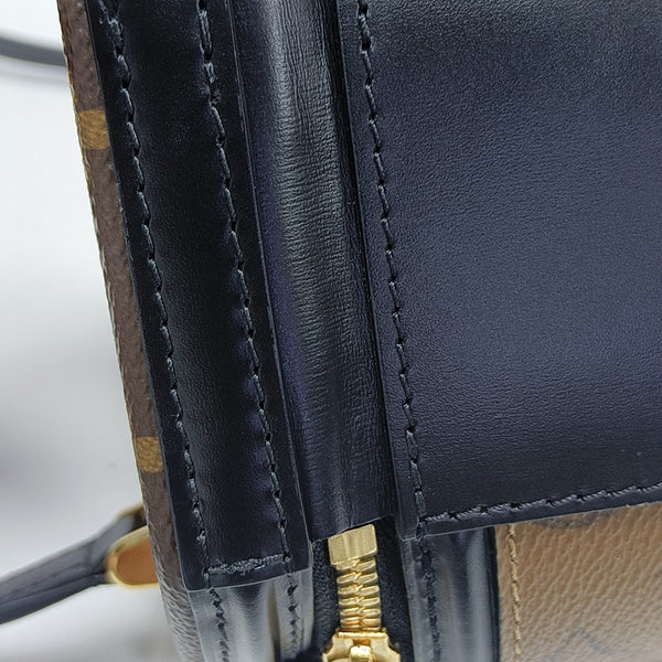 CANNES PM Monogram Coated Canvas Brown