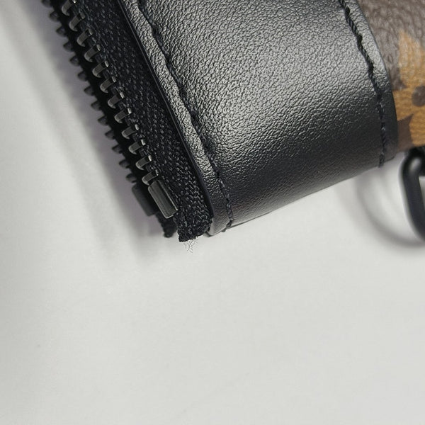 DISCOVERY Monogram Coated Canvas Brown