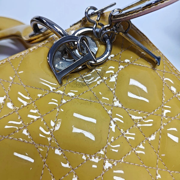 Authenticated pre-owned  Lady Dior Medium Quilted Patent Leather Yellow - Tote Bag at Looply