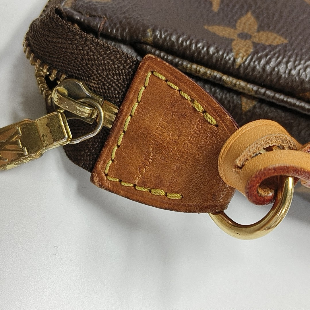ACCESSOIRES GM Monogram Coated Canvas Brown