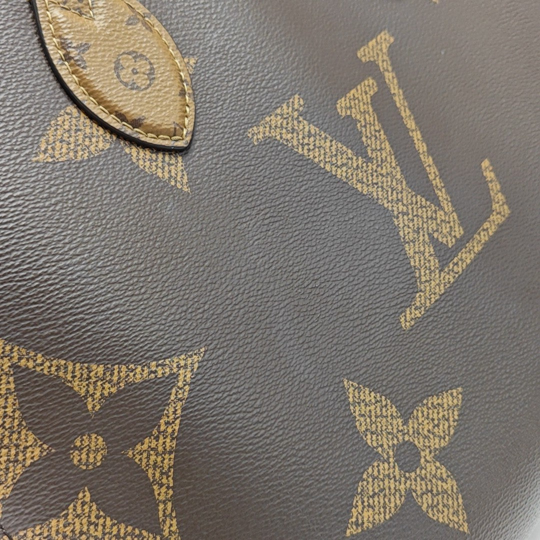 ONTHEGO MM Monogram Coated Canvas Brown