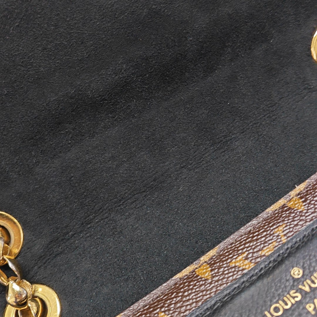 VICTOIRE Monogram Coated Canvas Brown