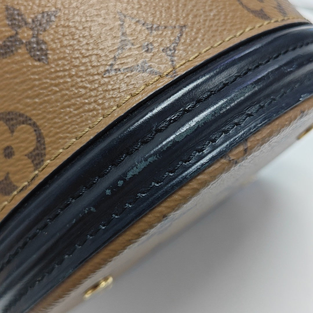 CANNES PM Monogram Coated Canvas Brown