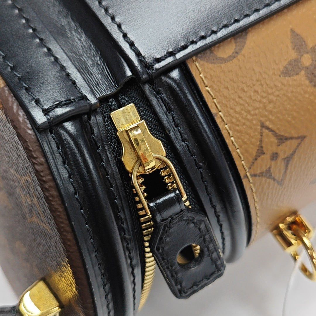CANNES PM Monogram Coated Canvas Brown