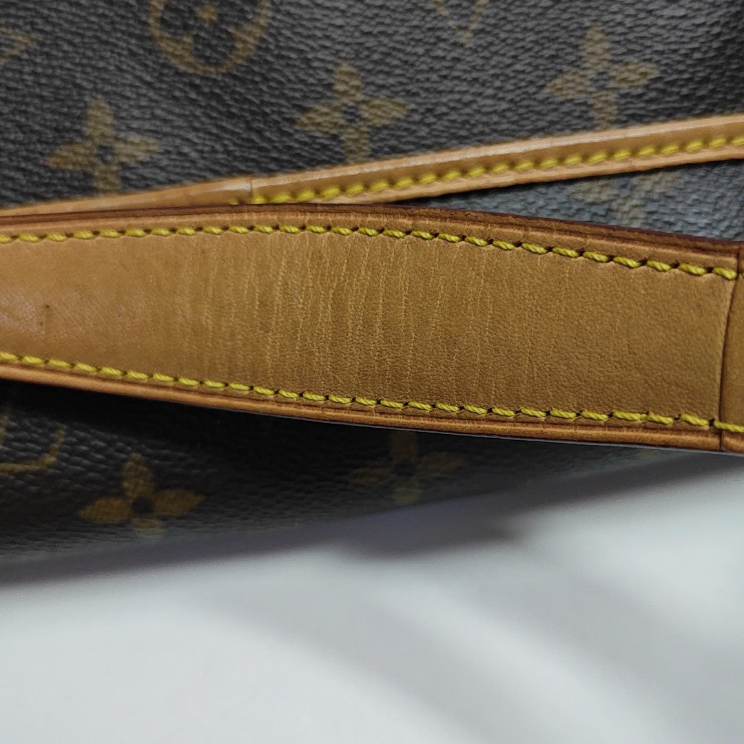 TIKAL Monogram Coated Canvas Brown