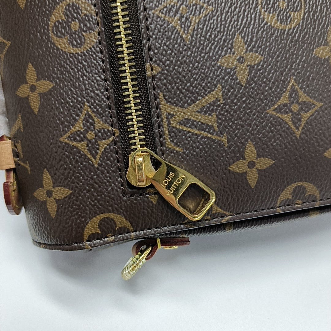 MÉTIS MM Monogram Coated Canvas Brown