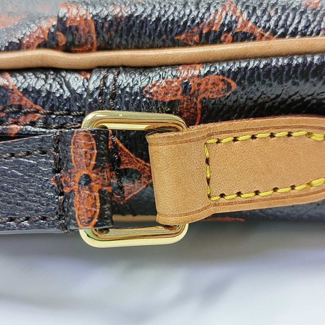 DANUBE Monogram Coated Canvas Brown