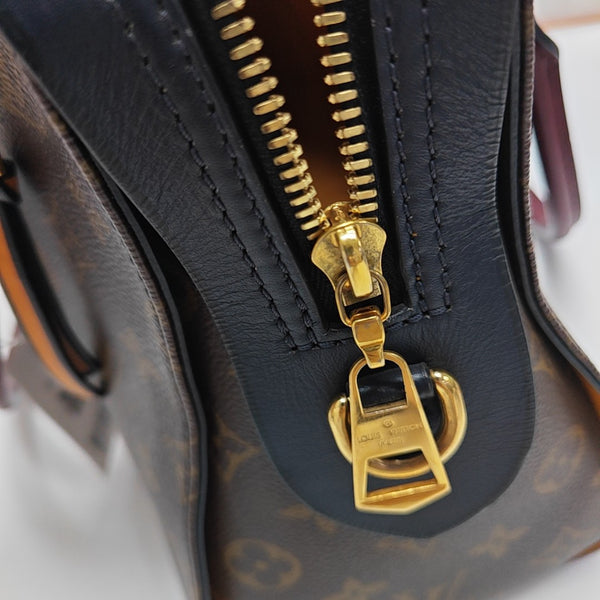 TUILERIES Monogram Coated Canvas Brown