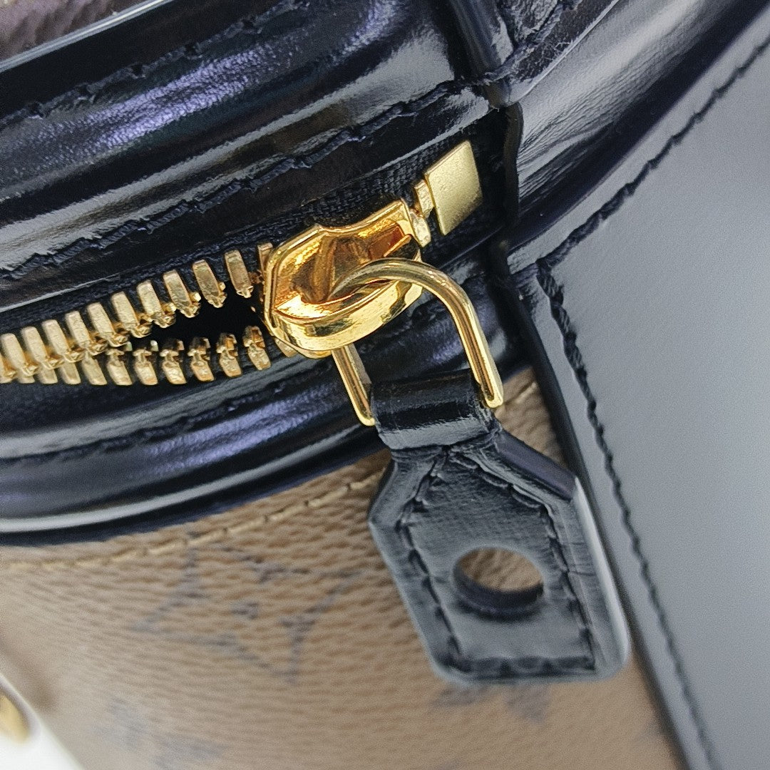 CANNES PM Monogram Coated Canvas Brown