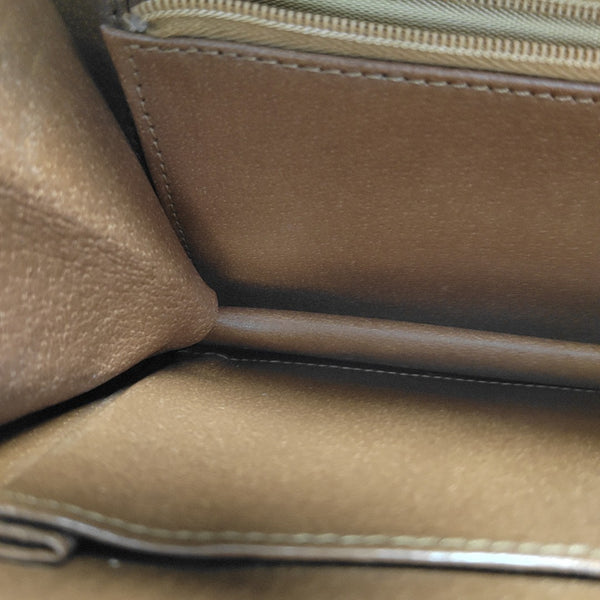 DAME Monogram Coated Canvas Brown