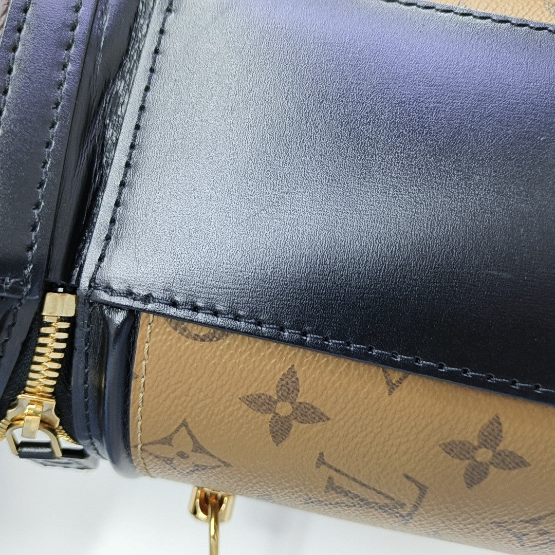 CANNES PM Monogram Coated Canvas Brown