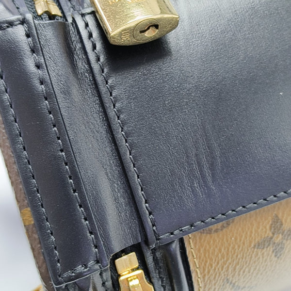 CANNES PM Monogram Coated Canvas Brown