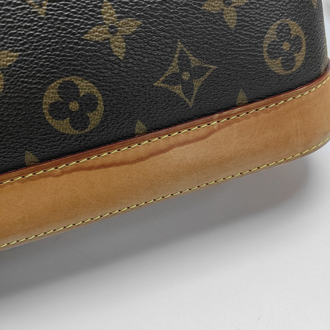 ALMA PM Monogram Coated Canvas Brown