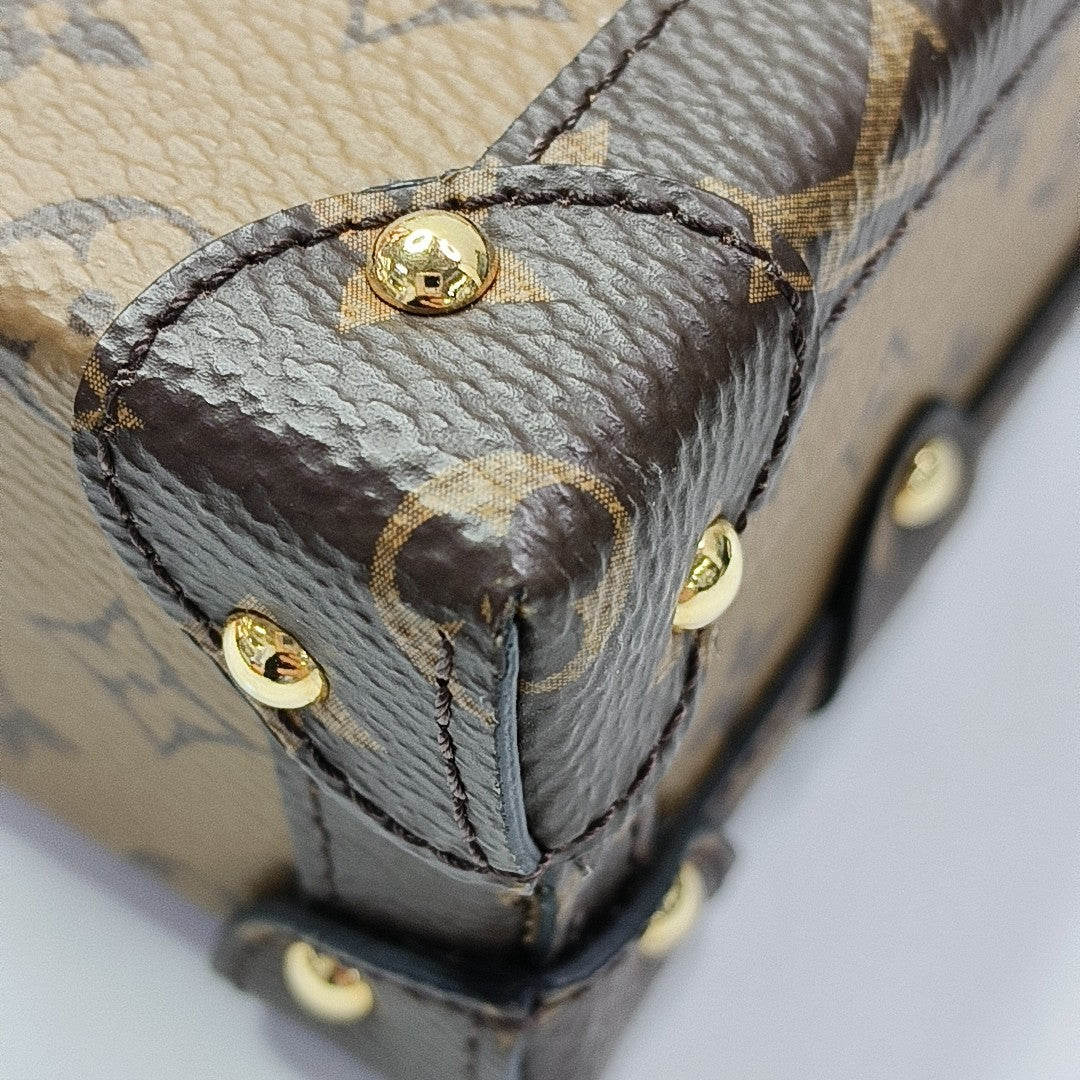 PETITE MALLE Monogram Coated Canvas Brown