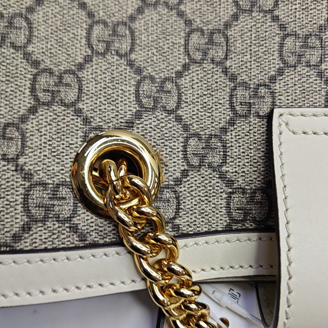 Padlock Small Monogram Coated Canvas Beige