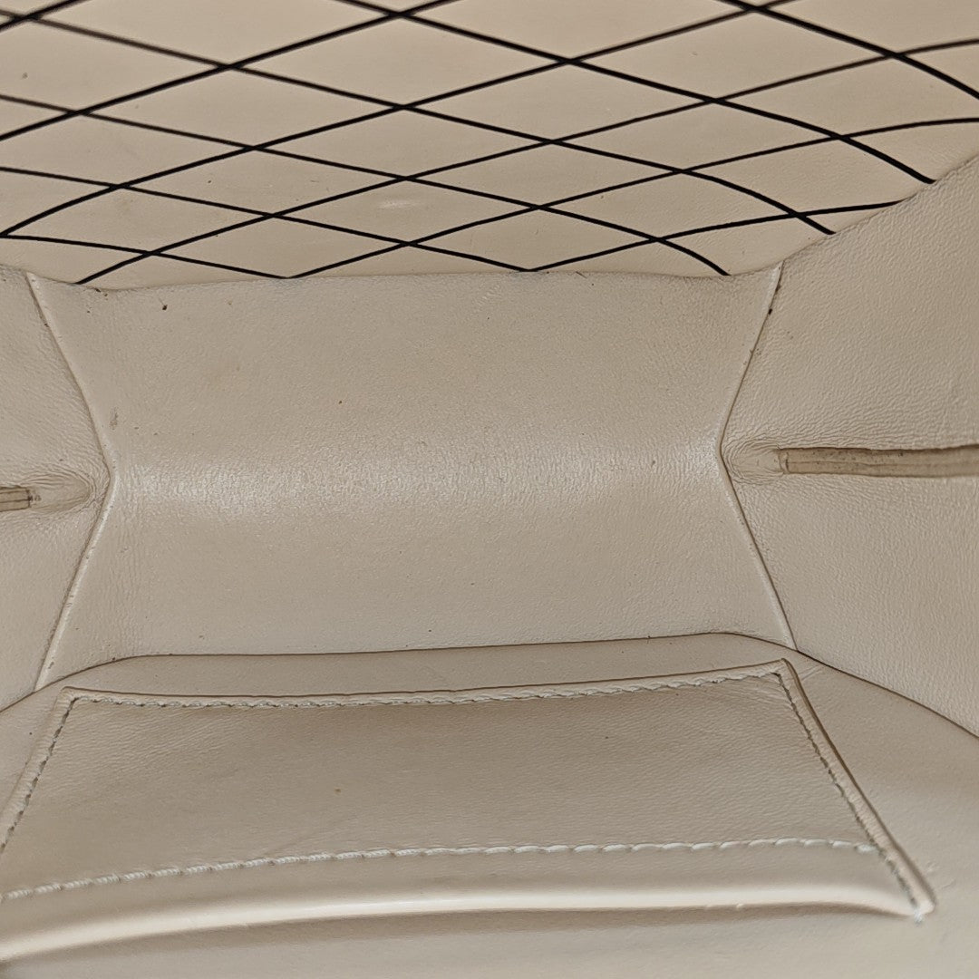 BOITE CHAPEAU PM Monogram Coated Canvas Brown