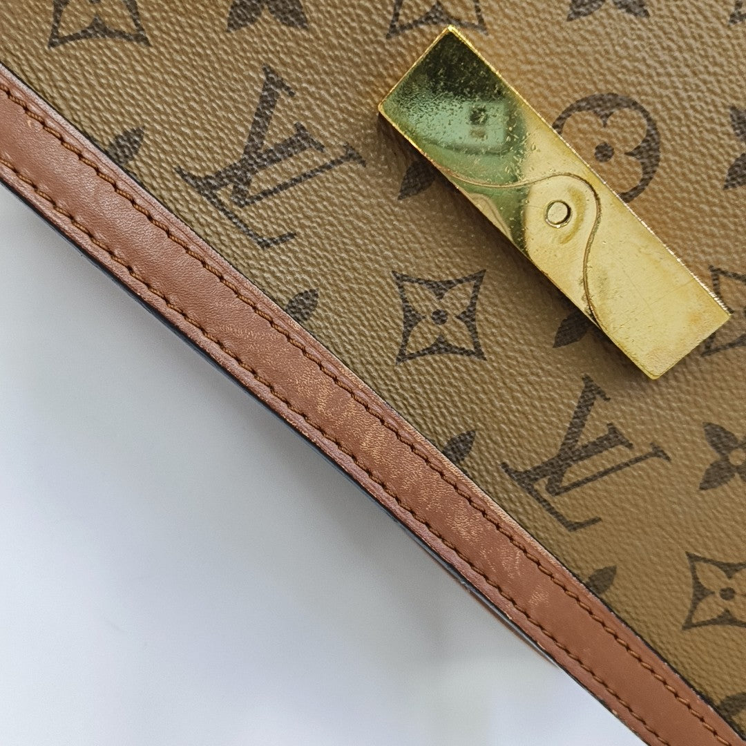 DAUPHINE MM Monogram Coated Canvas Brown
