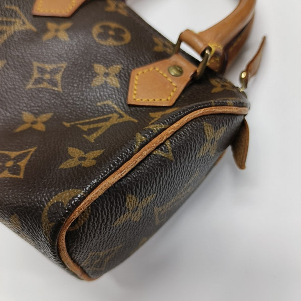SPEEDY Monogram Coated Canvas Brown
