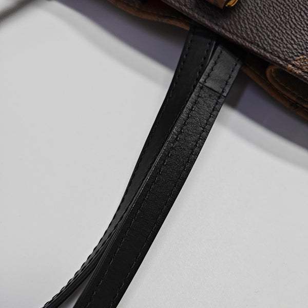 ONTHEGO MM Monogram Coated Canvas Brown