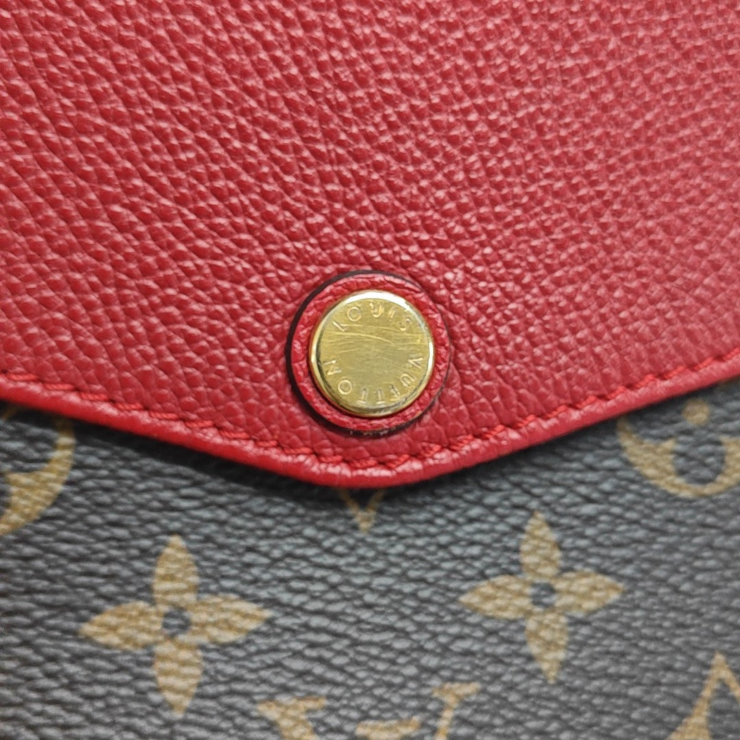 TWICE Monogram Coated Canvas Brown