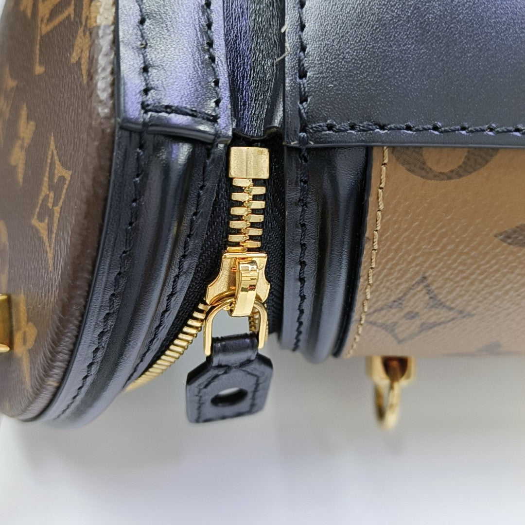 CANNES PM Monogram Coated Canvas Brown