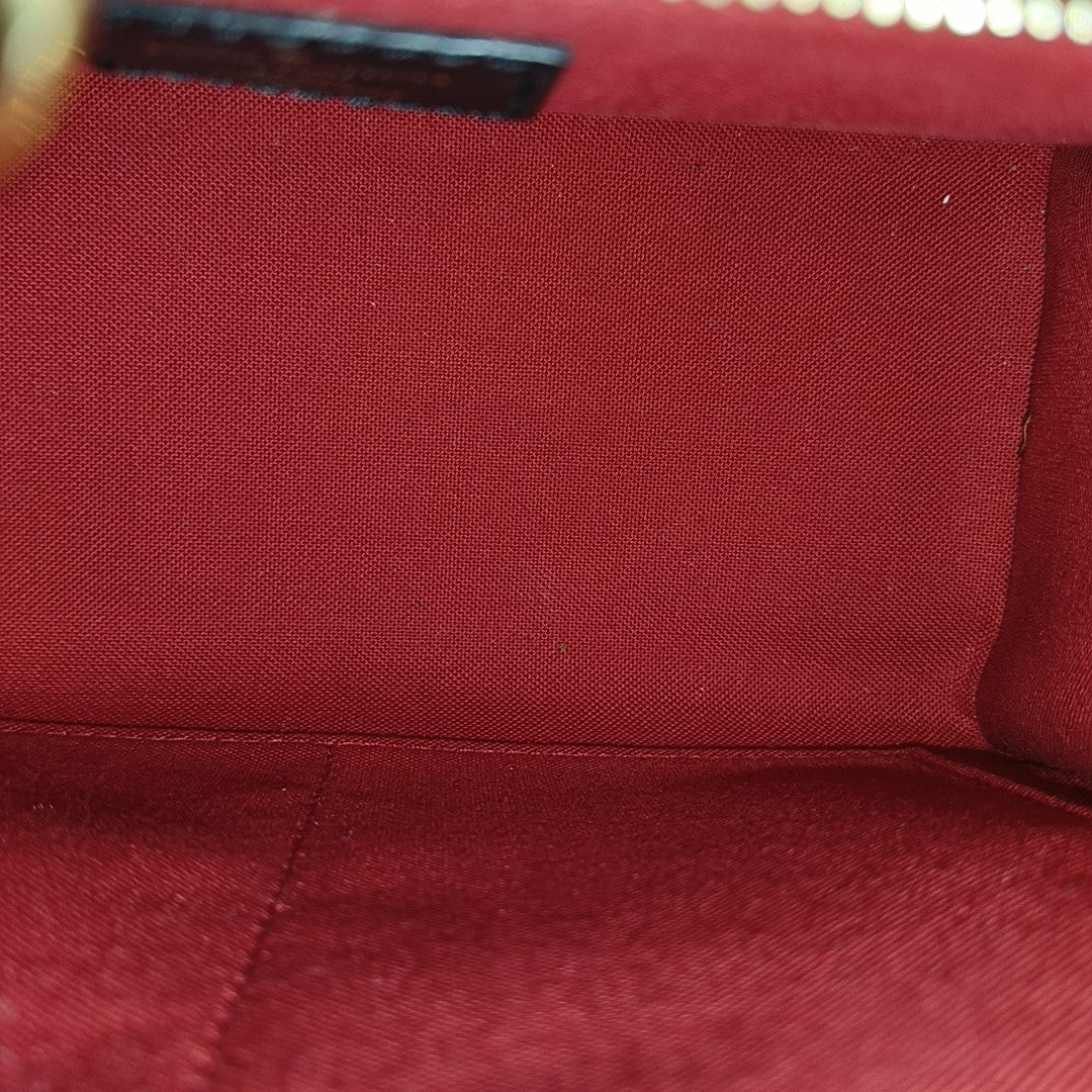 ONTHEGO PM Monogram Coated Canvas Brown