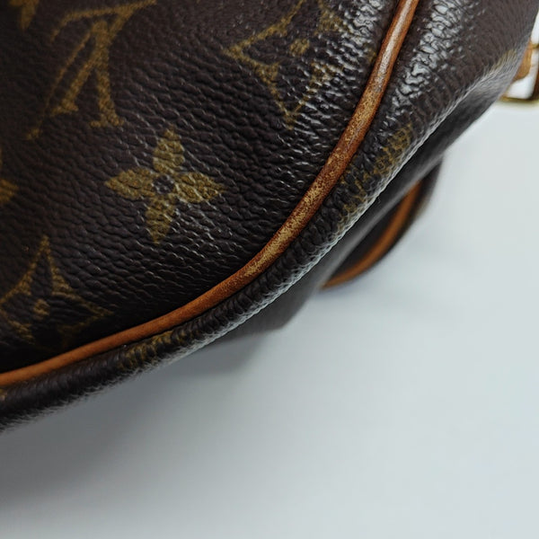 SAUMUR Monogram Coated Canvas Brown
