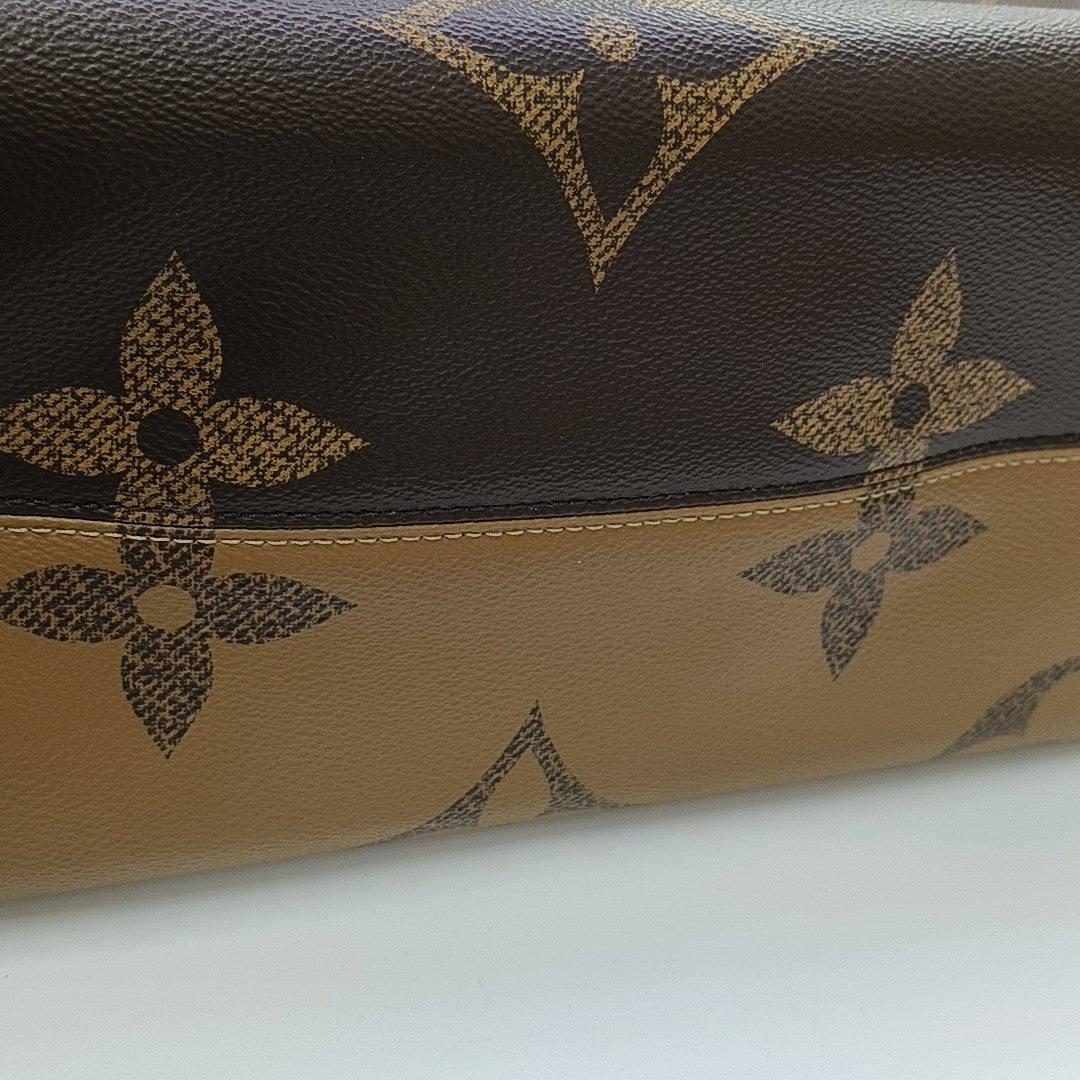 ONTHEGO GM Monogram Coated Canvas Brown
