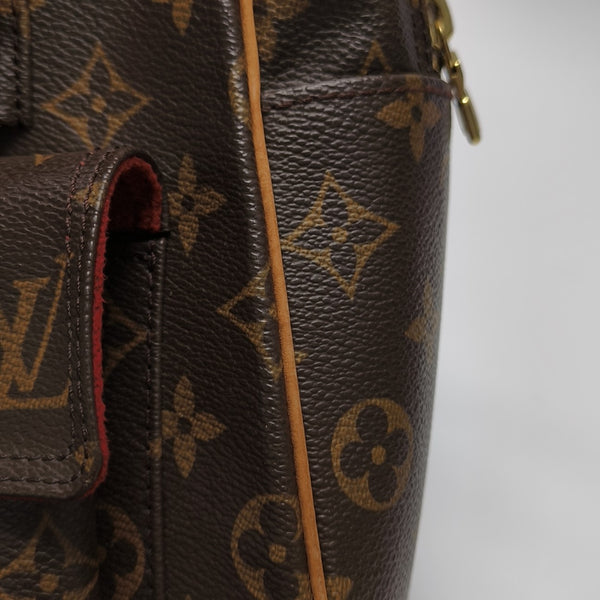 EXCENTRI-CITE Monogram Coated Canvas Brown
