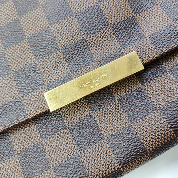 FAVORITE MM Damier Ebene Coated Canvas Brown
