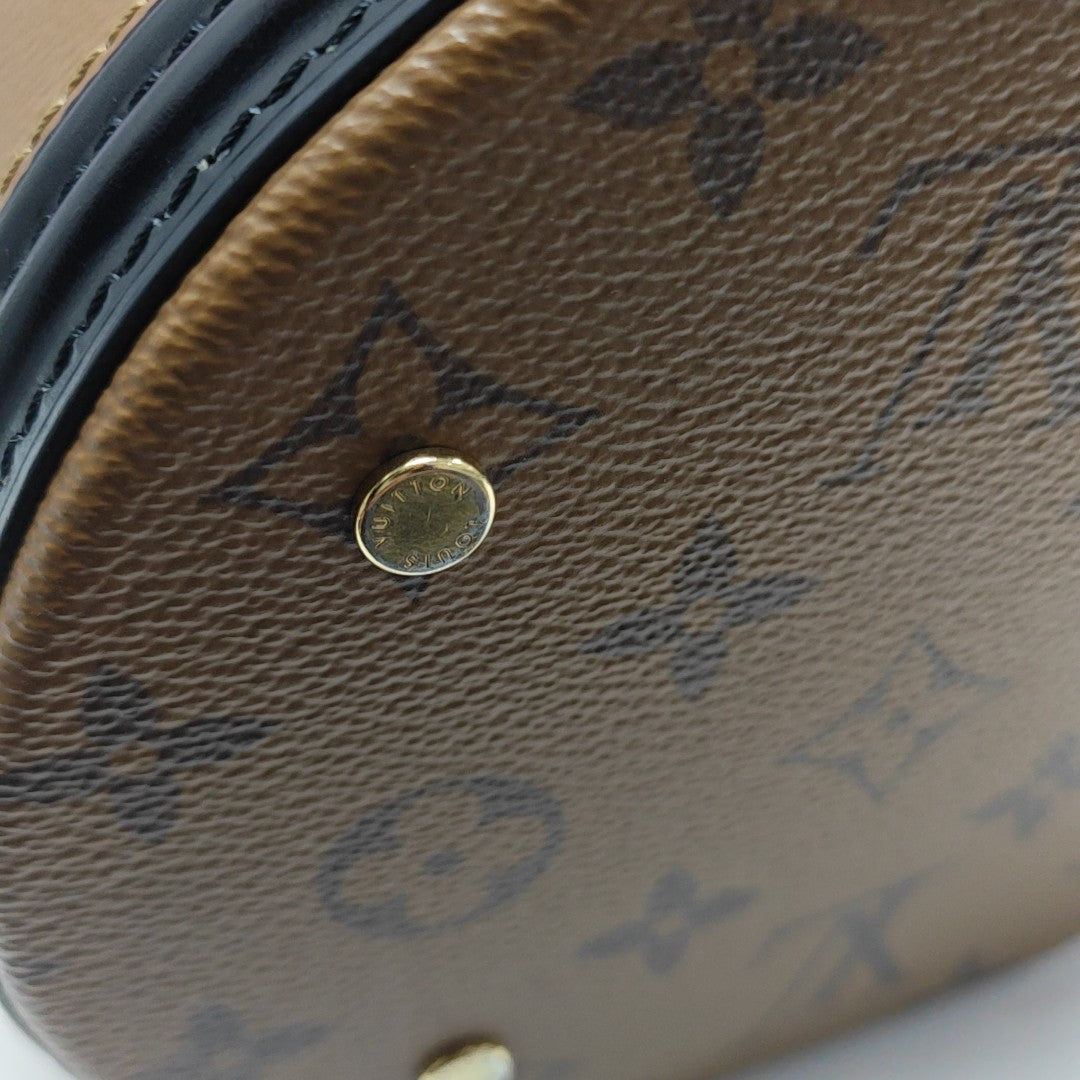 CANNES PM Monogram Coated Canvas Brown