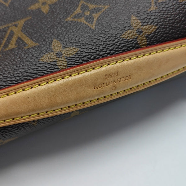 MÉTIS EAST WEST Monogram Coated Canvas Brown